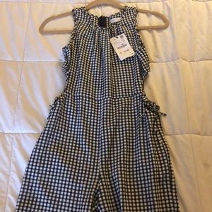 New with tags black and white checkered jump suit